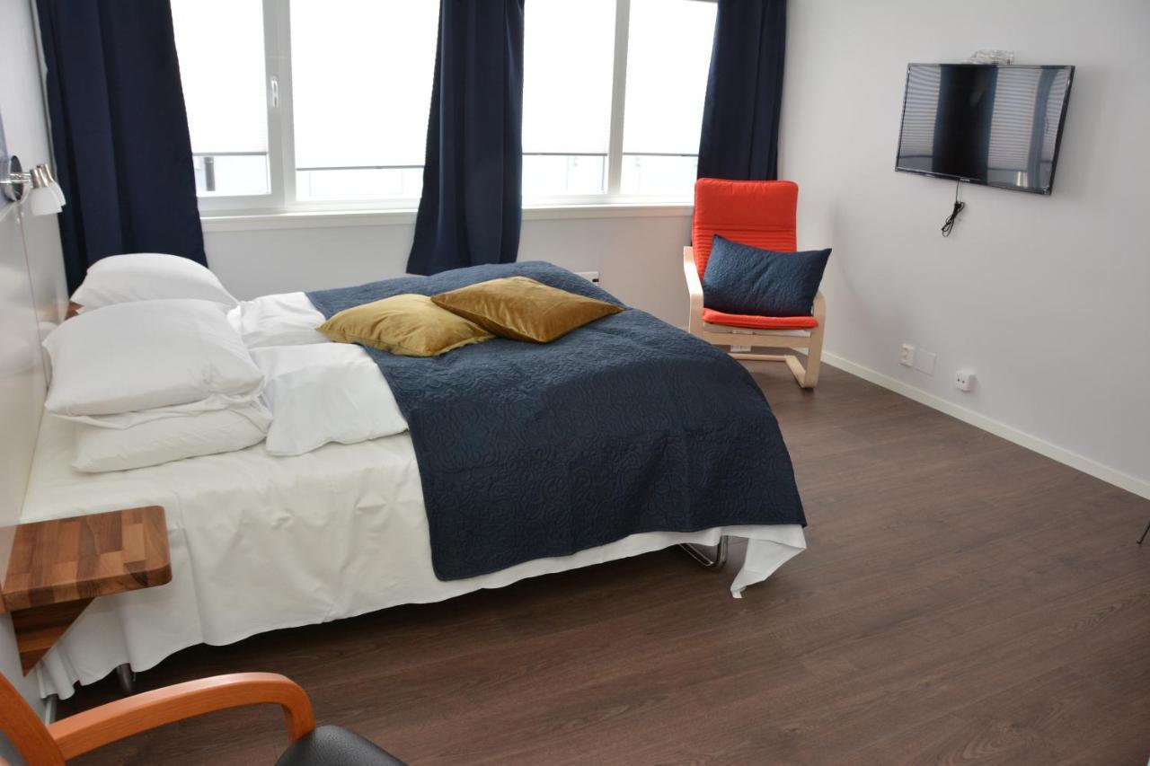 Husnes Sentrum Hotell Buitenkant foto